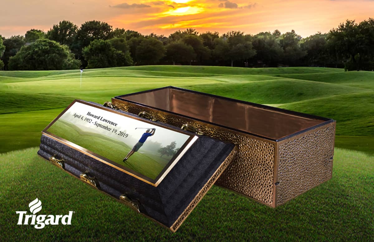 A personalized burial vault with a photo of the deceased