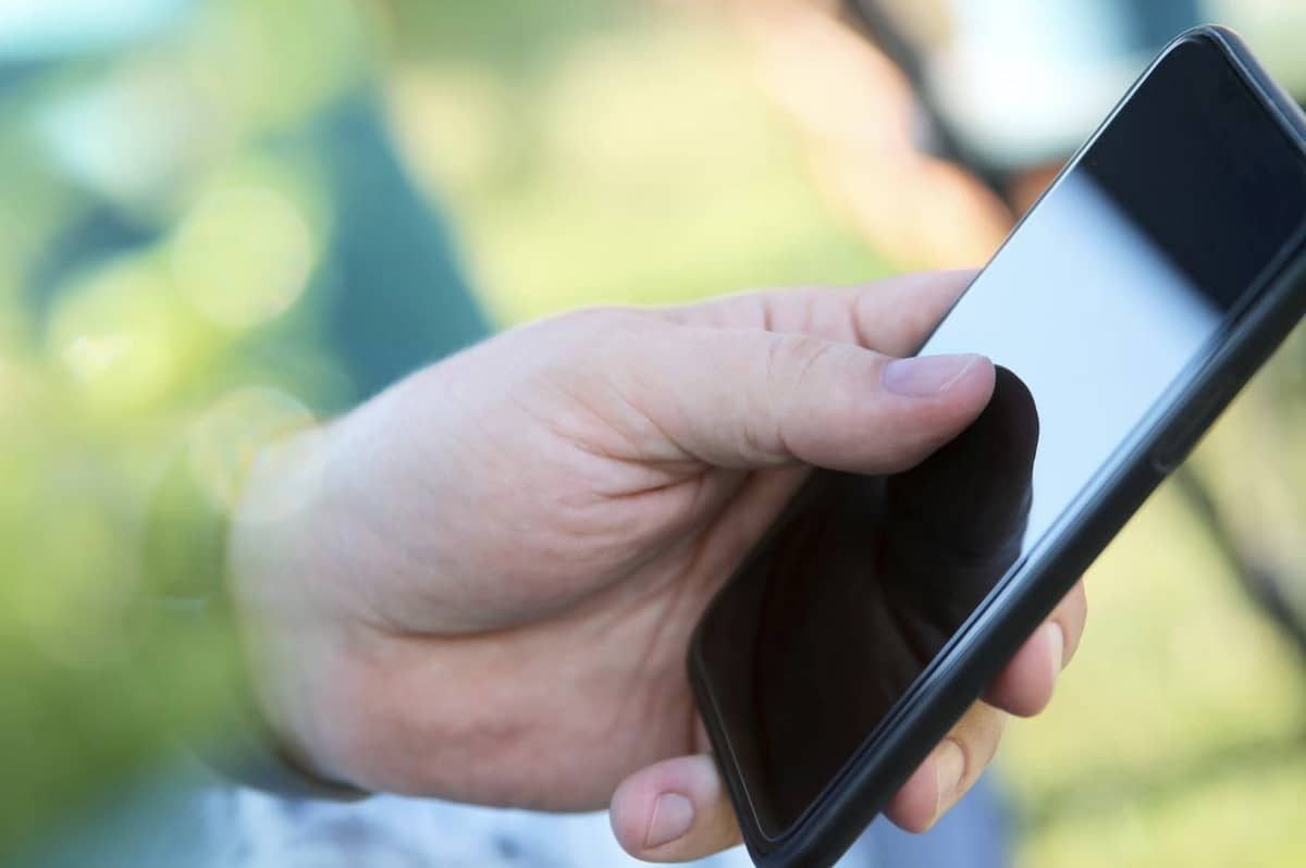 Someone holding a phone